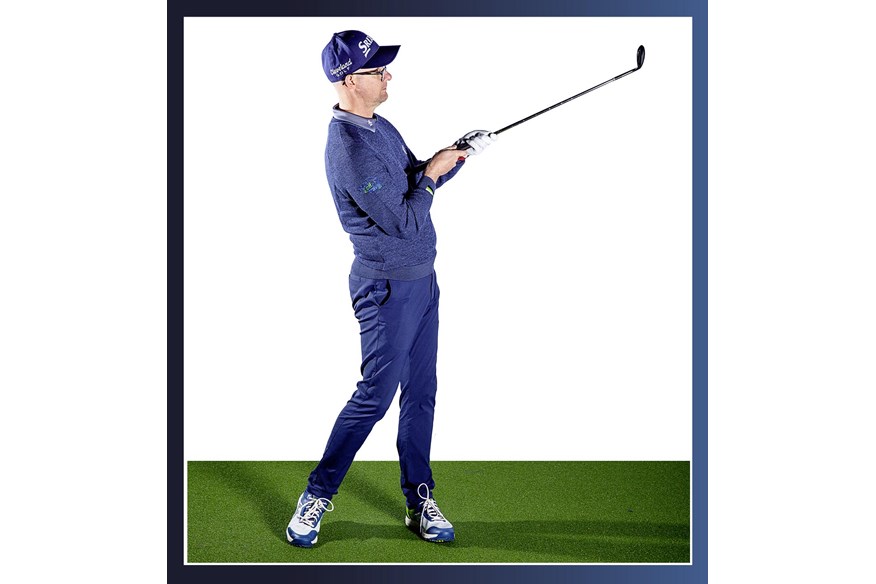 Mark Crossfield demonstrates how to get the chest through and up when playing golf chip shots.